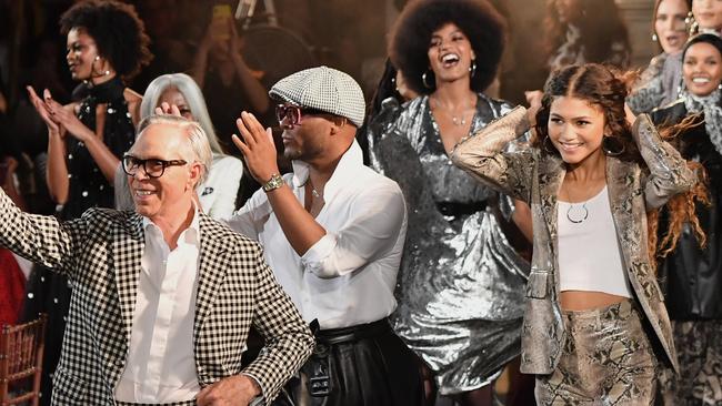 Designer Tommy Hilfiger and actress Zendaya walk the runway at the Tommy Hilfiger TommyNow fall runway show at the Apollo Theater on September 8, 2019 in New York City. (Photo by Angela Weiss / AFP)