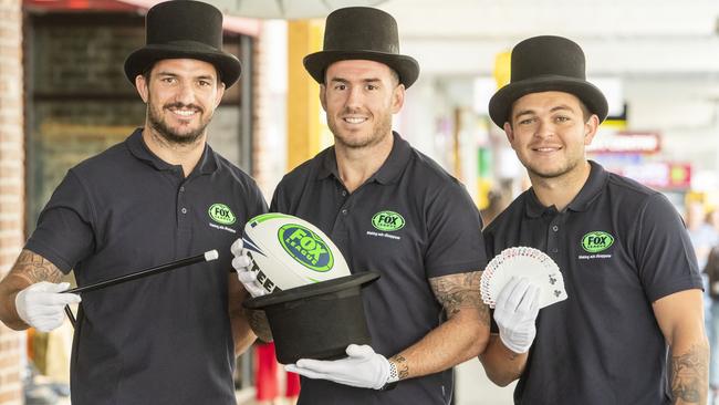 Boyd with Matt Gillett and Titan Ashley Taylor prepare for Magic Round. Image: AAP Image/Glenn Hunt) 