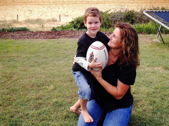 Happier times, Mr McCullough as a five-year-old with his mum at Wamberal in 2006. Picture: Peter Clark