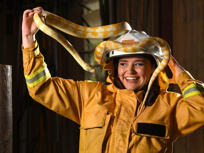 Icons of Hahndorf 2025 Calendar_March. Hahndorf CFS firefighter Holli Pietrobon at Hahndorf Farm Barn with Rumplesnakeskin. Photo: Tricia Watkinson*COPYRIGHT HAHNDORF CFS*