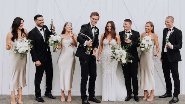 Ryan Lester and Emi Zorko with their bridal party including Dayne Zorko (best man), Sean Lester, Jamie Papanicolaou and Sasha Zorko (maid of honour), Brittany Valle, Chealsey Saunderson.