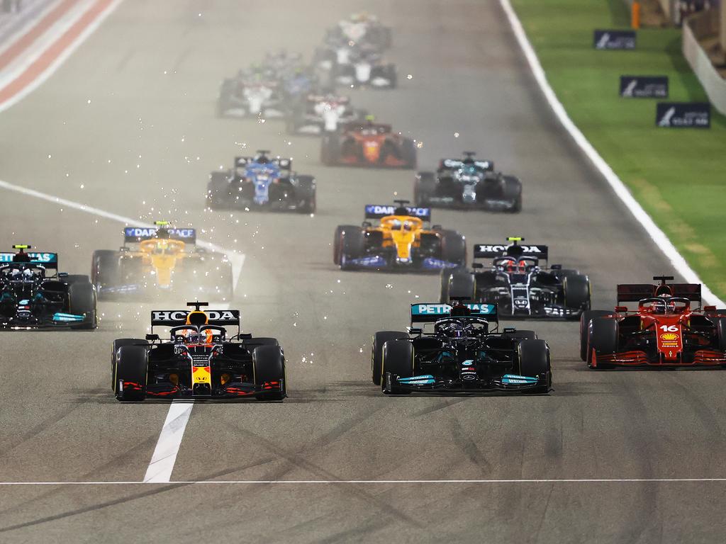 Max Verstappen and Lewis Hamilton compete for position on track during the F1 Grand Prix of Bahrain. (Photo by Bryn Lennon/Getty Images)