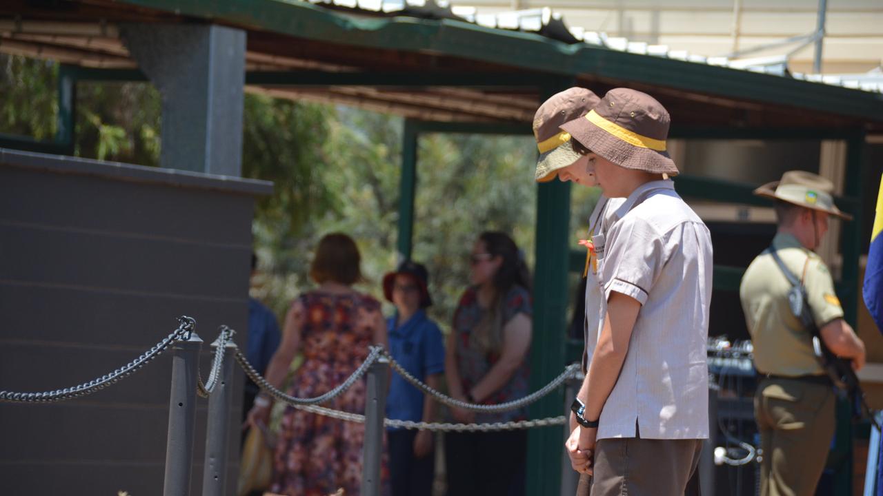 Kingaroy St John's captains Emma Wilks and Ben Springwood lay wreaths during the 2019 Kingaroy Remembrance Day service at KSHS. (Photo: Jessica McGrath)