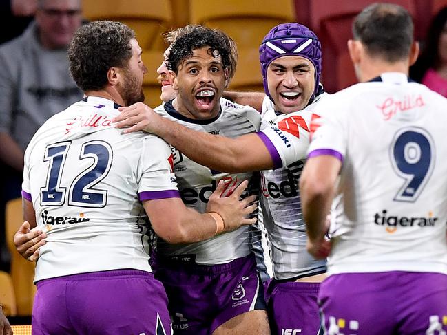 BRISBANE, AUSTRALIA - JULY 24: Josh Addo-Carr of the Storm celebrates scoring a try during the round 11 NRL match between the Brisbane Broncos and the Melbourne Storm at Suncorp Stadium on July 24, 2020 in Brisbane, Australia. (Photo by Bradley Kanaris/Getty Images)