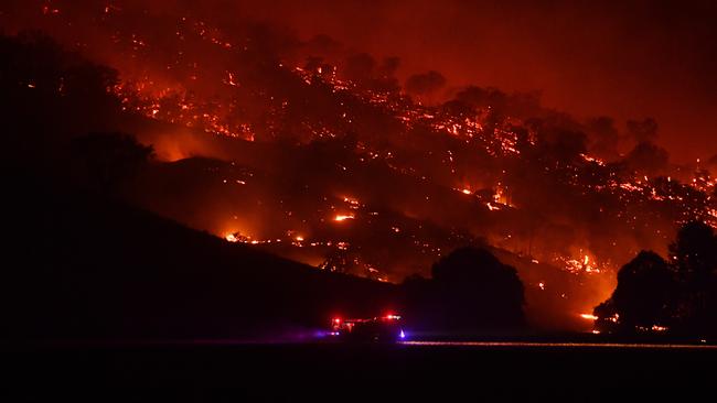 Rural Fire Service firefighters conduct property protection patrols at Mount Adrah, NSW. Picture: Getty Images