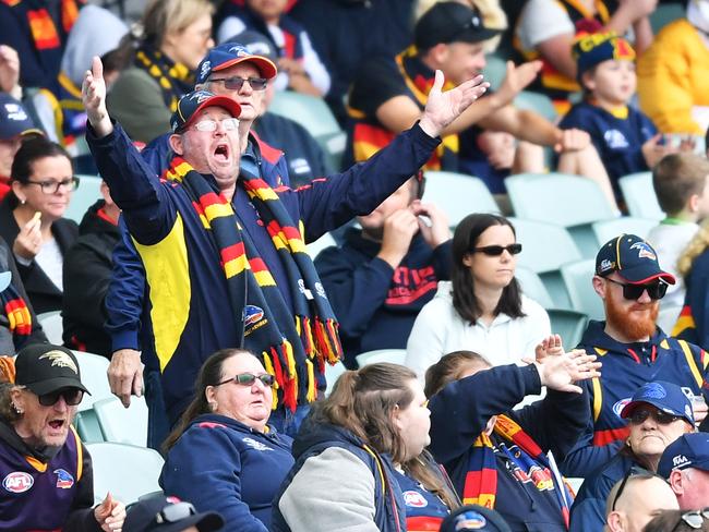 ADELAIDE, AUSTRALIA - JULY 26: Crows supporters during the round 8 AFL match between the Adelaide Crows and the Essendon Bombers at the Adelaide Oval on July 26, 2020 in Adelaide, Australia. (Photo by Mark Brake/Getty Images)