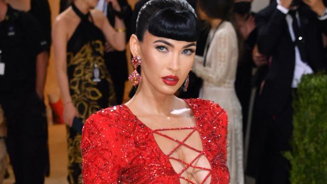 US actress Megan Fox arrives for the 2021 Met Gala at the Metropolitan Museum of Art on September 13, 2021 in New York. - This year's Met Gala has a distinctively youthful imprint, hosted by singer Billie Eilish, actor Timothee Chalamet, poet Amanda Gorman and tennis star Naomi Osaka, none of them older than 25. The 2021 theme is "In America: A Lexicon of Fashion." (Photo by ANGELA  WEISS / AFP)