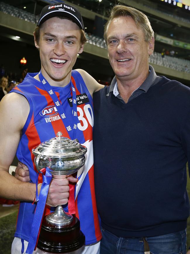 Darcy and Peter Moore together after winning the TAC Cup Grand Final.