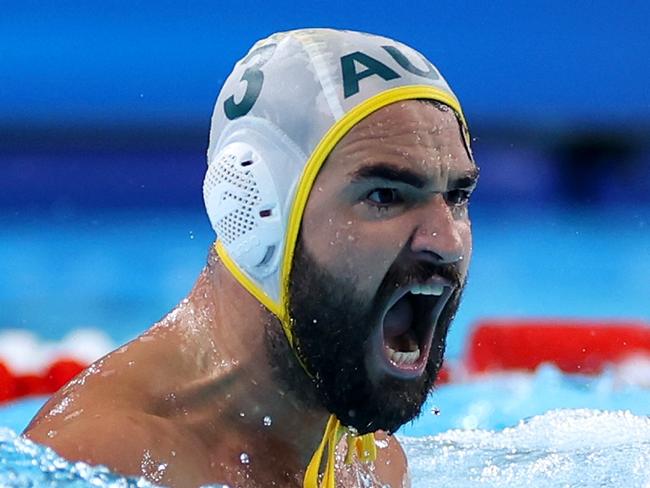 NANTERRE, FRANCE - AUGUST 05: Milos Maksimovic of Team Australia celebrates in the Men's Preliminary Round - Group B match between Team Australia and Team Japan on day ten of the Olympic Games Paris 2024 at Paris La Defense Arena on August 05, 2024 in Nanterre, France. (Photo by Sarah Stier/Getty Images)