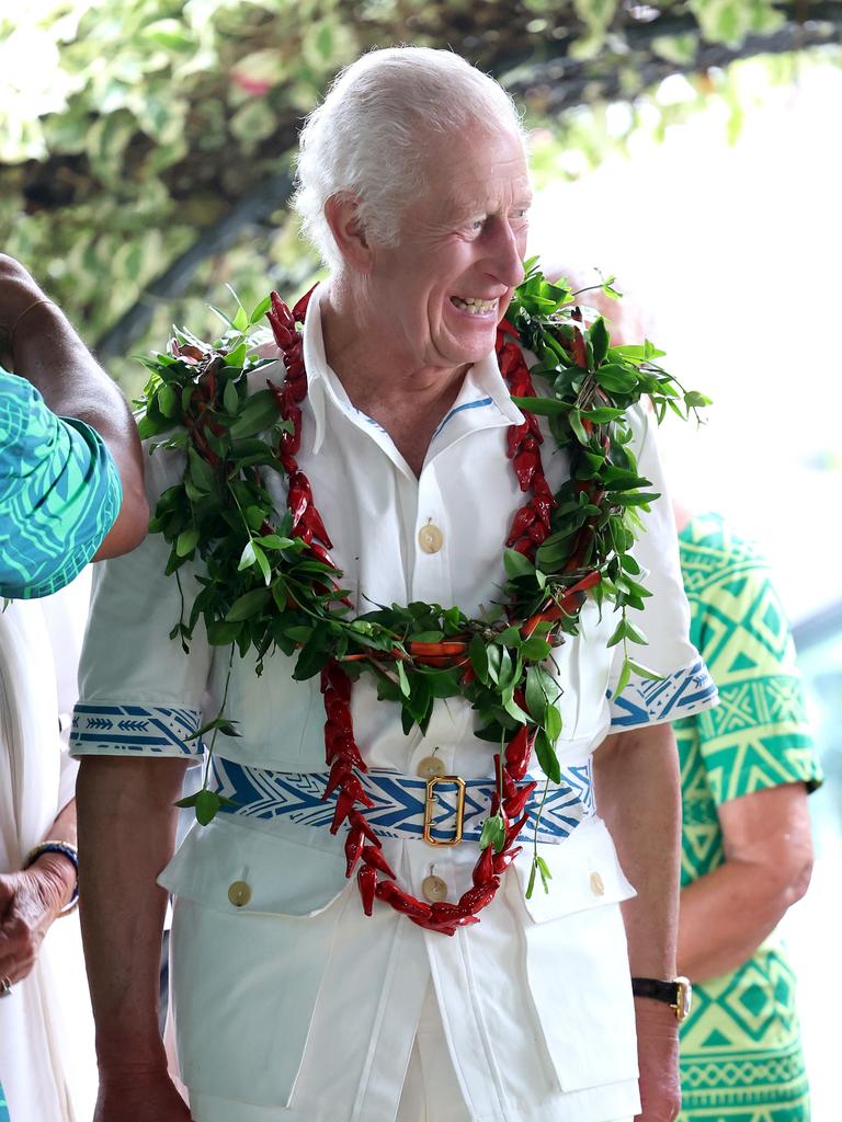 King Charles III wears a floral lei as he visits the Samoa Cultural Village. Picture: Getty Images