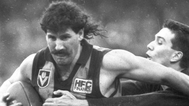 Robert DiPierdomenico, featuring mullet, and clean-cut Stephen Silvagni,