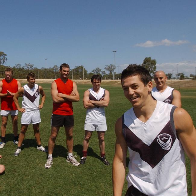 News BCM 10-10-04, Re Bali, The Billy Hardy Memorial Footy Game at Southport Sharks Footy Club, Jason Payte (right) with players before the match.