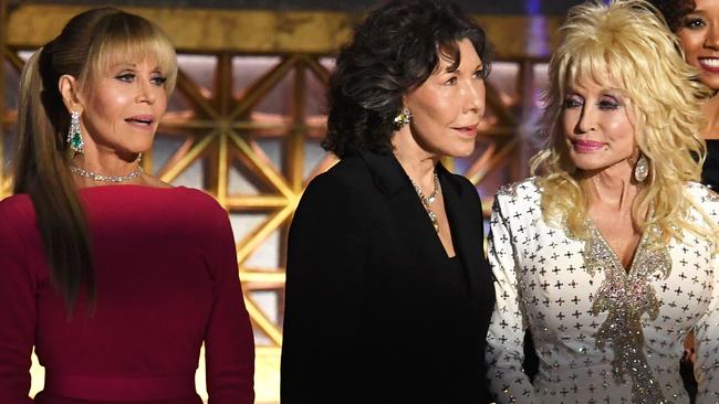 LOS ANGELES, CA - SEPTEMBER 17:  (L-R) Actors Jane Fonda, Lily Tomlin and Dolly Parton speak onstage during the 69th Annual Primetime Emmy Awards at Microsoft Theater on September 17, 2017 in Los Angeles, California.  (Photo by Kevin Winter/Getty Images)