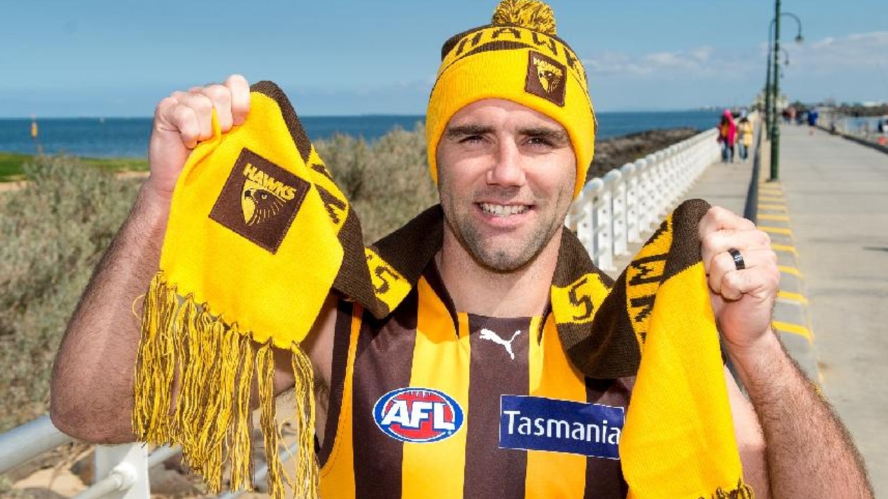 Melbourne Storm captain Cameron Smith in his Hawthorn supporter gear.