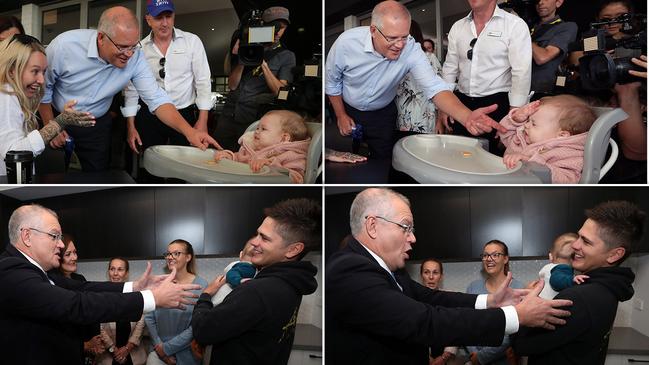 Prime Minister Scott Morrison gets the hand to the forehead treatment from Amalia Glastonbury while Freddie won’t leave dad Jacob’s arms on Wednesday. Pictures: Gary Ramage