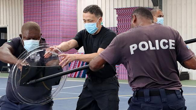 Solomons police train with the China Police Liaison Team this week. Picture: AFP