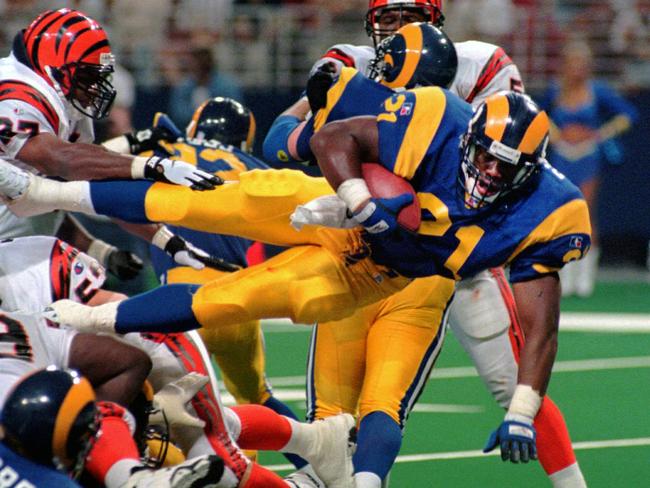 Lawrence Phillips, 21, gaining yards for the St. Louis Rams. Picture: L.G. Patterson/AP