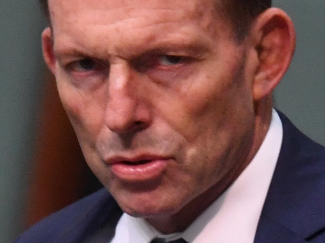 Former prime minister Tony Abbott arrives during House of Representatives Question Time at Parliament House in Canberra, Tuesday, August 8, 2017. (AAP Image/Lukas Coch) NO ARCHIVING
