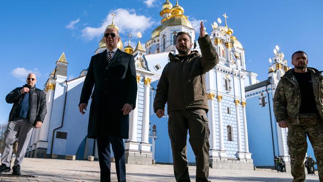 Joe Biden walks with Ukrainian President Volodymyr Zelensky at St. Michael's Golden Domed Cathedral in Kyiv. Picture: AFP.