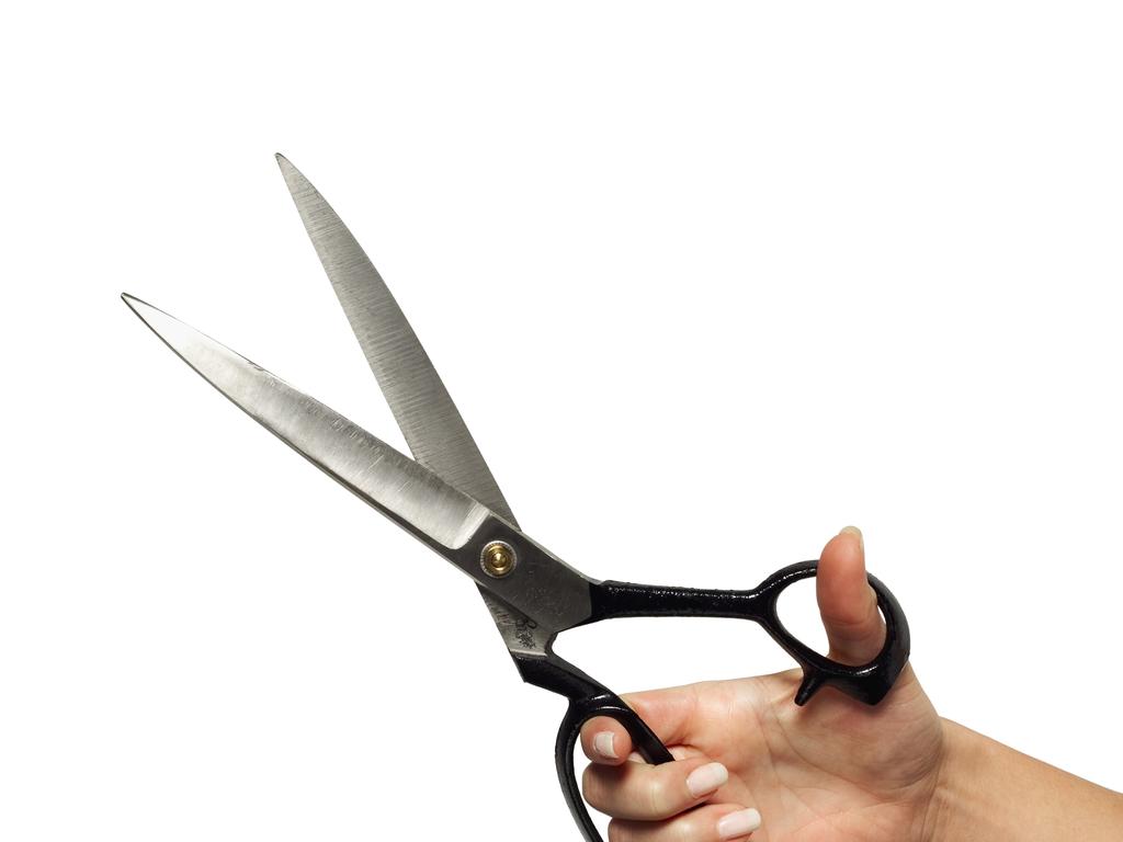 A teenage boy held a pair of open scissors to the neck of an adult and told them: “I’ll f**king stab you”, a court has heard.