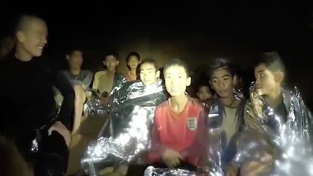 A video grab handout made available by the Thai Navy SEALs shows some of the members of a soccer team in a section of Tham Luang cave in Chiang Rai, Thailand. Photo by Thai Navy SEALs via Getty Images.