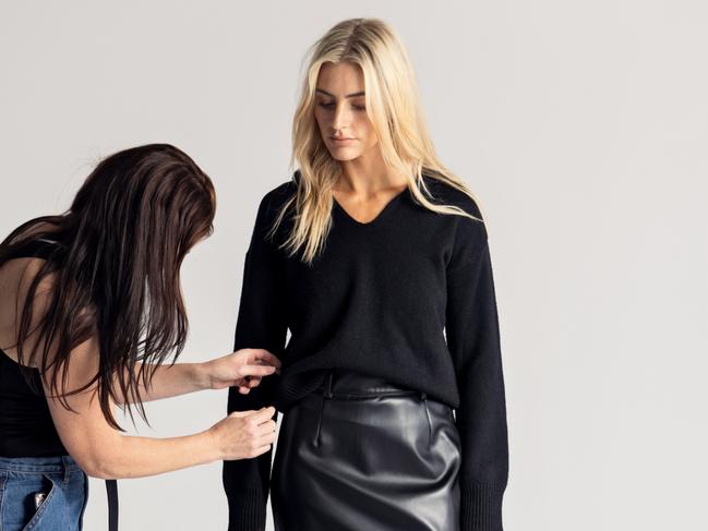 Romy The Brand. Clothing designed by Tasmanian fashion designer Emma Petterwood. Emma styling a model during a photo shoot. FOR TASWEEKEND. Picture: Supplied