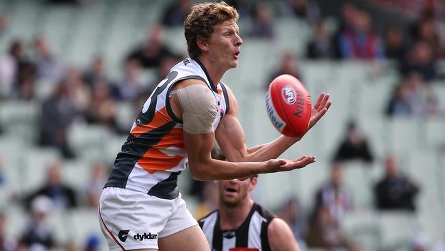 Will Hoskin-Elliott takes a mark against Collingwood last season. Picture: George Salpigtidis