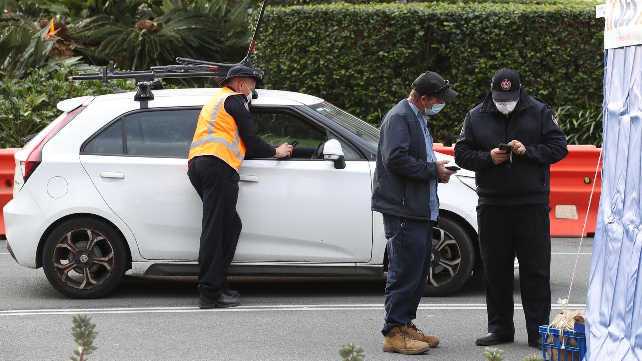 The hard border and long Queues return to the Qld NSW border on the Gold Coast. People getting the thumbs up or turned away in Griffith St Coolangatta. Picture: Glenn Hampson.