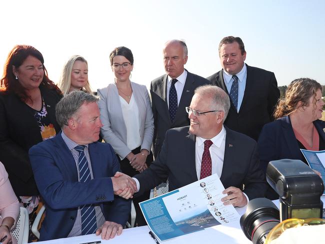 Then-Premier Will Hodgman and Prime Minister Scott Morrison at the signing of the Hobart City Deal at Hobart Airport Picture: LUKE BOWDEN