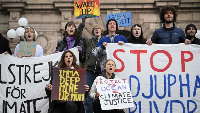 Greta Thunberg (rights) leads climate activists who would like to restrict the goods and fuels people use. Picture: AFP