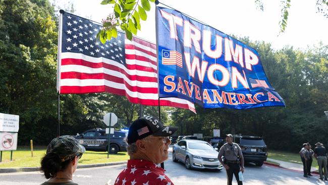 Supporters of former President Donald Trump outside of the Fulton County Jail ahead of Trump's surrender. Picture: Getty Images via AFP.