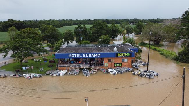 Flooding at the Euramo Hotel with locals traveling by boat for a drink. Photo - Tori Muzic