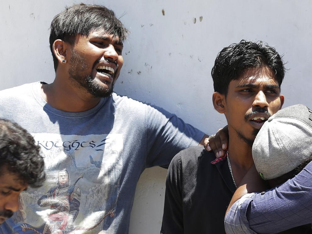 Relatives of people killed in Church blasts mourn as they wait outside mortuary of a hospital in Colombo, Sri Lanka, Sunday, April 21, 2019. Picture: AP Photo/Eranga Jayawardena