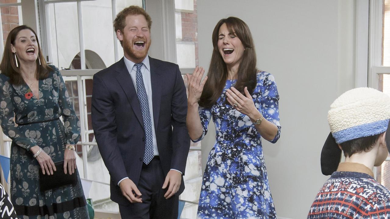 Prince Harry and Kate Middleton in hysterics at a welly wanging contest on October 26, 2015 in London. Picture: Tim Ireland/WPA/Getty Images