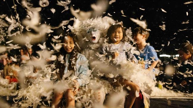 An angelic performer parties among WOMADelaide festivalgoers on Sunday night. Picture: Wade Whitington