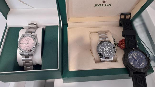 Police seized items that included luxury watches during Wednesday morning raids. Picture: NSW Police