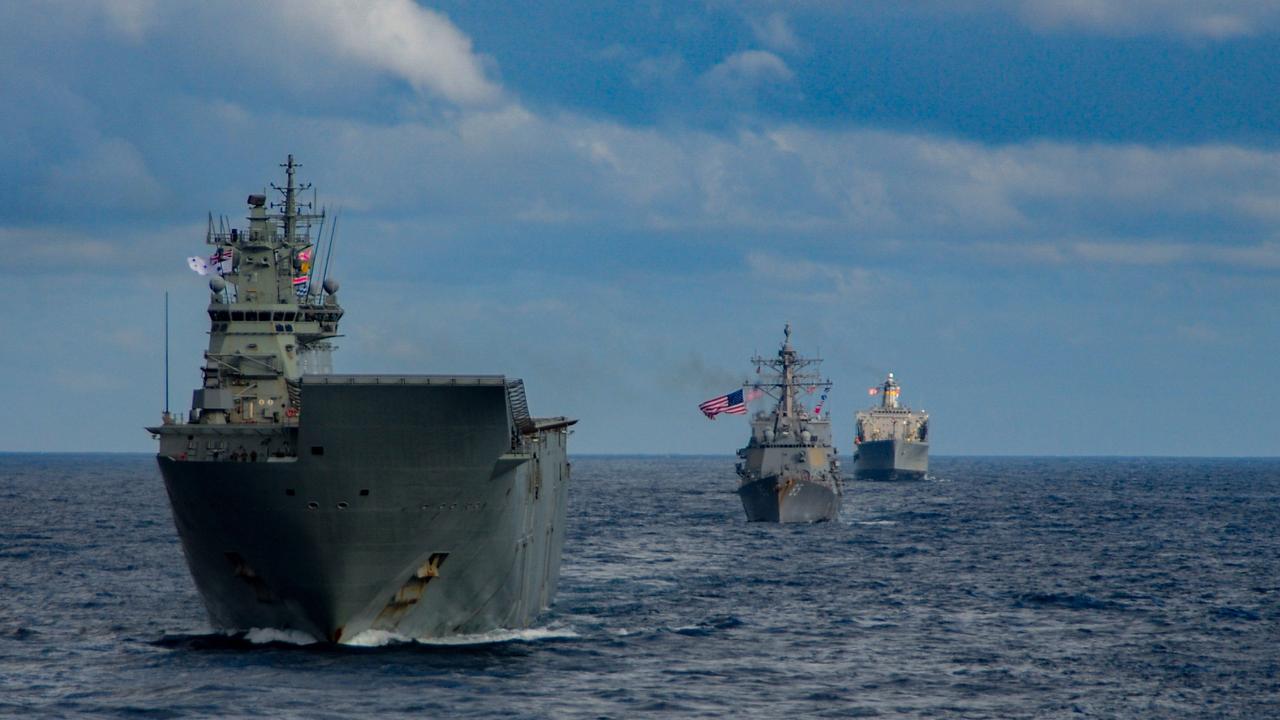 HMAS Canberra, front, during operation Talisman Sabre.