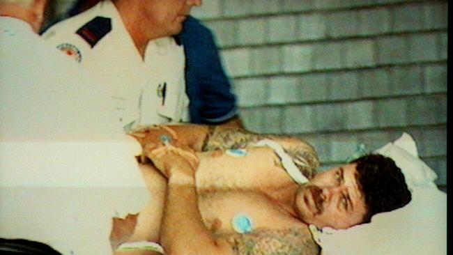 One of the victims is placed in an ambulance following the Tugun shooting. Picture: Channel 9