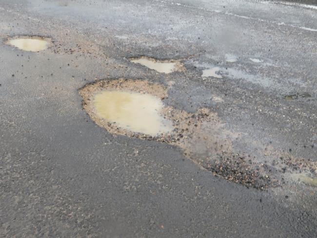 Among the worst of the potholes that have developed on the Palmerston Highway between the Millaa Millaa township and the Falls Teahouse in the past three weeks. David Anthony photo