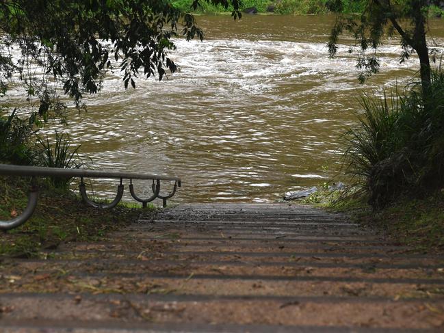 Gympie Wet Weather - Water level moving up the stairs at the Gympie Weir