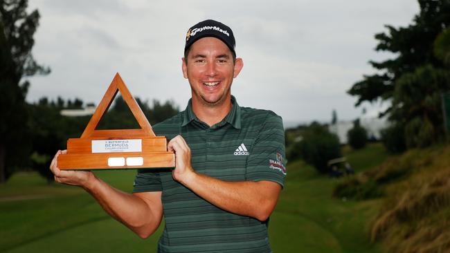 Lucas Herbert is all smiles after his win in Bermuda. Picture: Cliff Hawkins/Getty Images/AFP