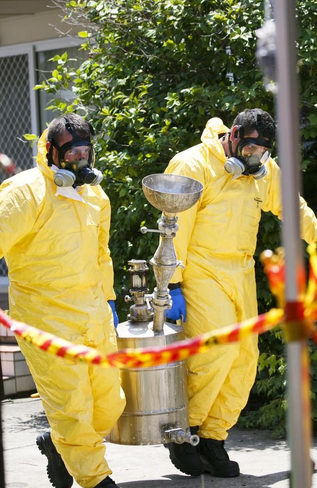 Police remove drug making equipment from the house. Picture: Tim Pascoe