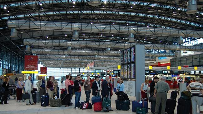 Passengers waiting to check-in. Picture: CorvairOwner