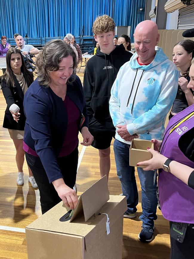 Labor candidate Letitia Del Fabbro, pictured with husband Chris and two of her children, casts her vote in the by-election.