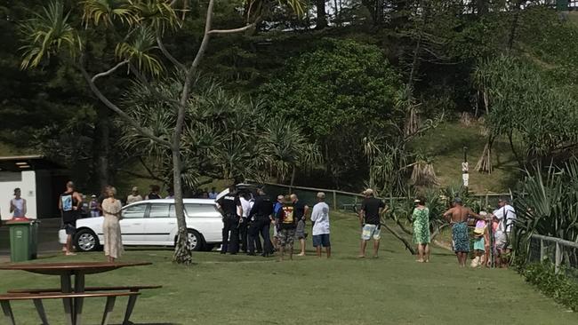 Family and friends of the surfer at the scene. Picture: Emily Halloran 