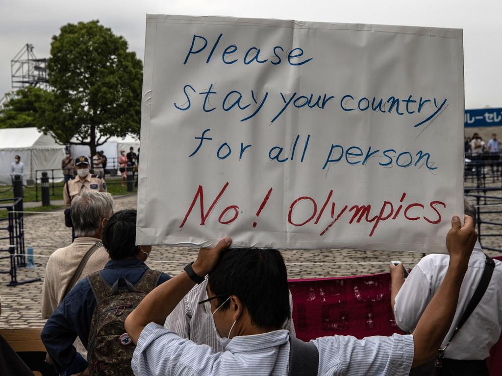 Protesters gather at Akarenga Park during a protest against the Tokyo 2020 Olympic Games.