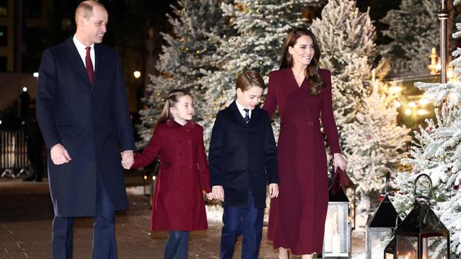 Prince William, Catherine, Princess of Wales with their children Princess Charlotte and Prince George at the "Together At Christmas Carol Service" at Westminster Abbey. Picture: AFP.