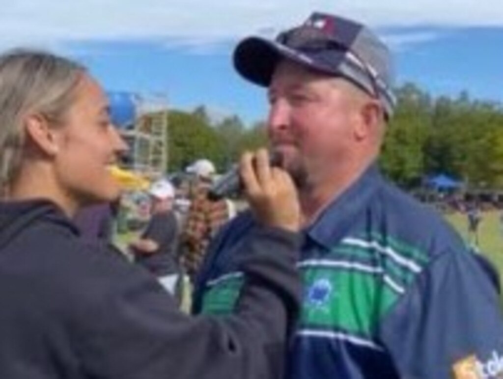 The Cathedral College player Armani Gretton shaving coach Scott Peters' beard after the team's historic grand final win at the Confraternity Shield.