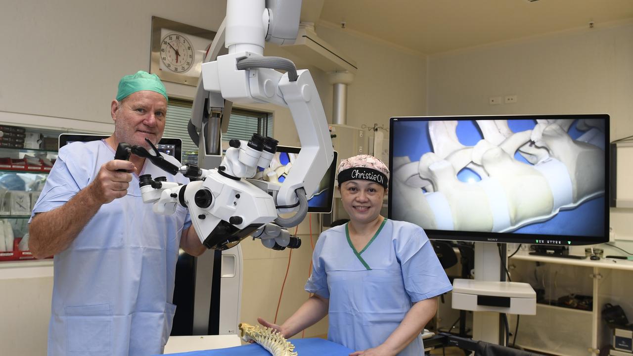 Townsville University Hospital staff with the new $1.2m operating microscope.