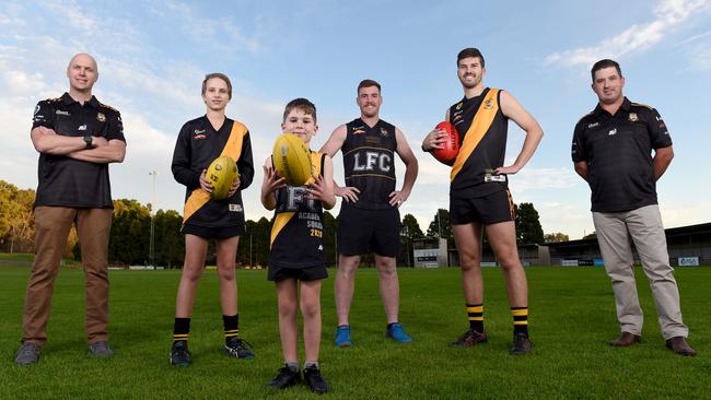 Sports clubs around the state are doing it tough, but the Lobethal Football Club is one of the few hit by both the bushfires and coronavirus. Pictured are Ryan Partridge (junior director) Torsten Skinner (under 14 player), Jensen Blundell (under 8 player) Matthew Fuller (coach), Cooper Skinner (senior player) and Travis Blundell (senior committee member). Picture: Naomi Jellicoe